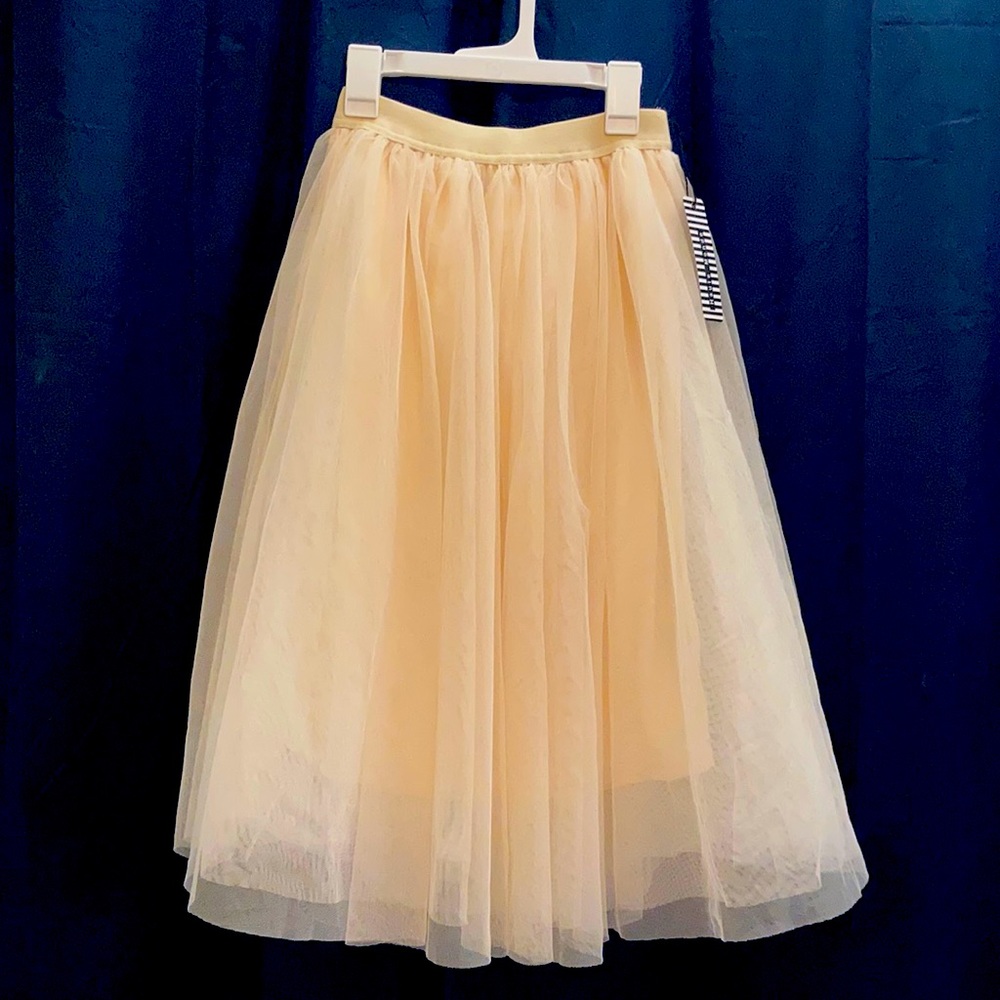 Long cream tulle skirt new with tags. Size S.